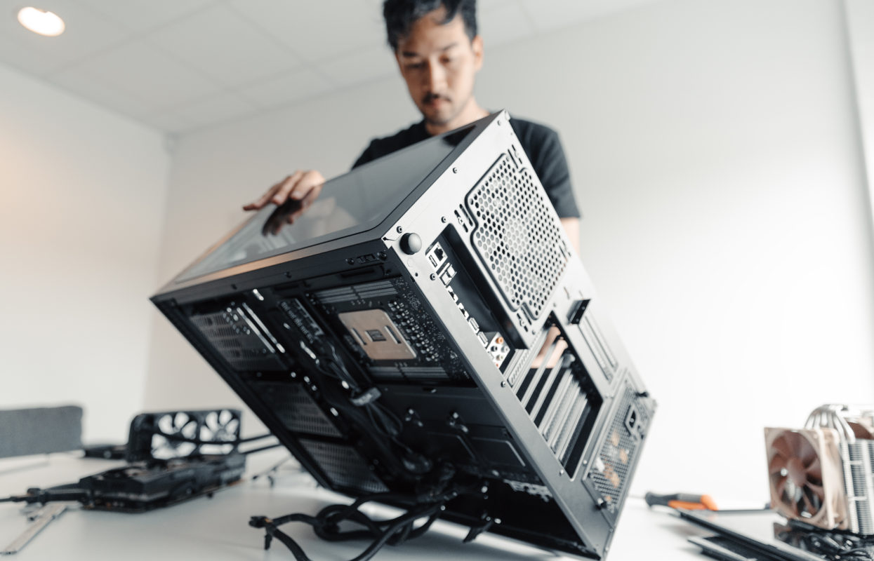 Image of Fractal Design Employee and a computer